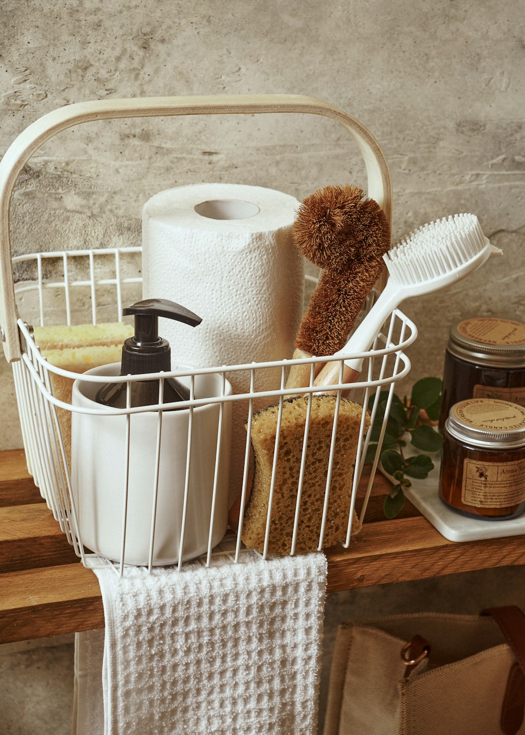 a-white-basket-filled-with-lots-of-bathroom-items-hyeztrmq6ye